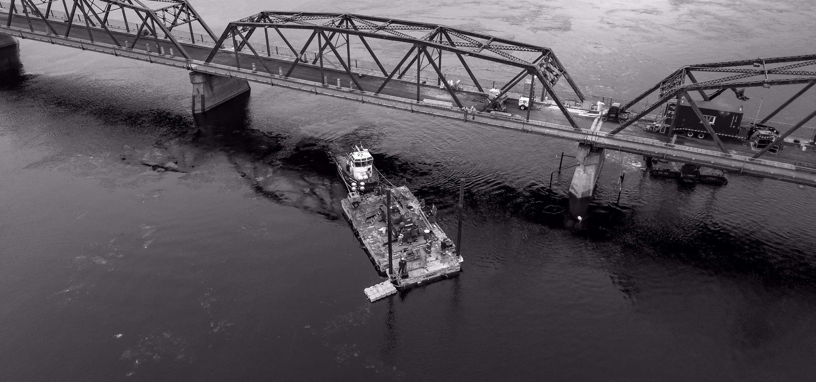 Nitrox Welding maritime job site under a bridge in the Saguenay